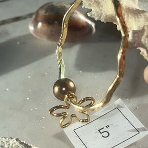 Gold and Brown Wavy Bangle Bracelet with Brown Pearl Bead and Flower Charm